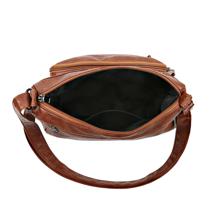 Konf | Le sac en bandoulière cuir tyni